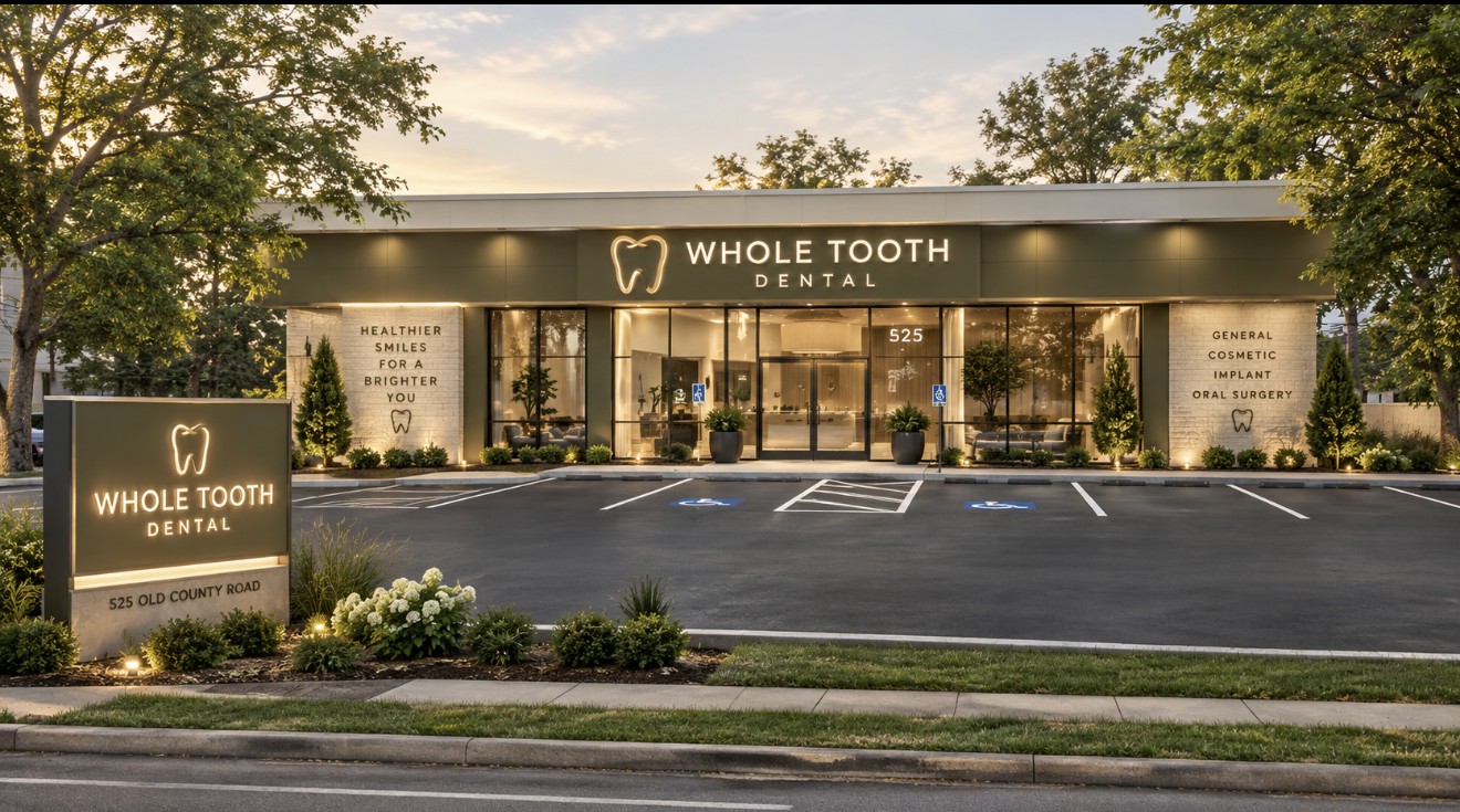 Whole Tooth Dental at 525 Old Country Road in Plainview, New York, lit at dusk